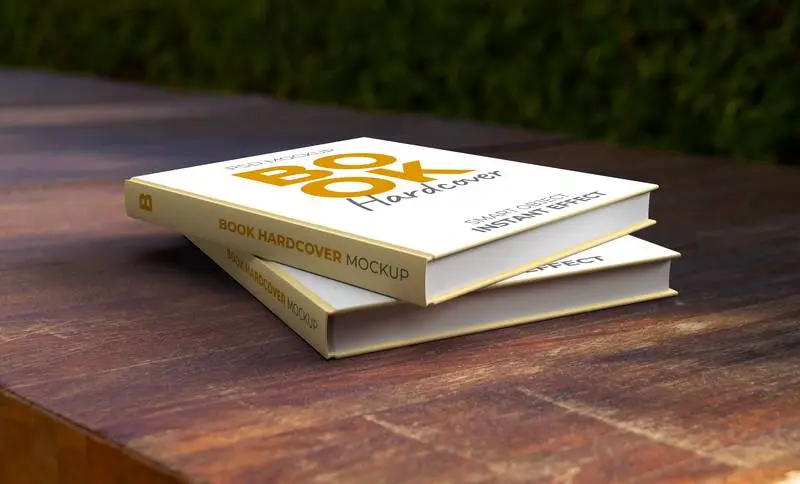 Mockup of Two Hardcover Books in an Outdoor Scene