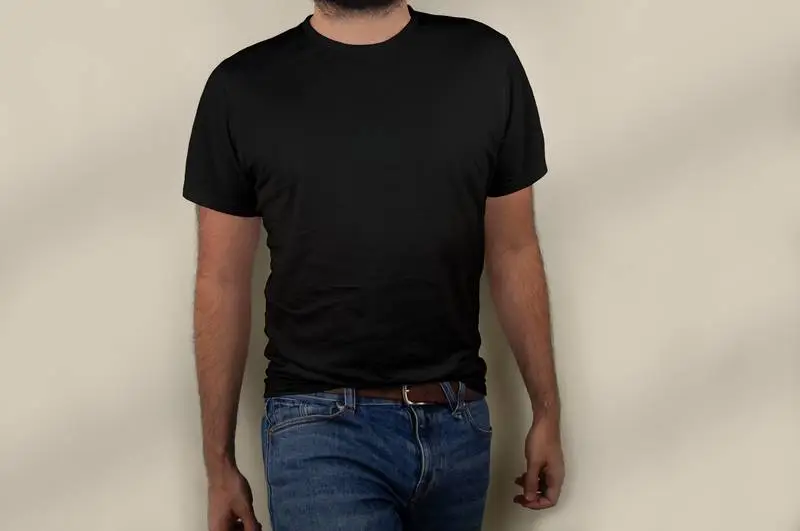 Photo of a Male Model Wearing Black T-shirt