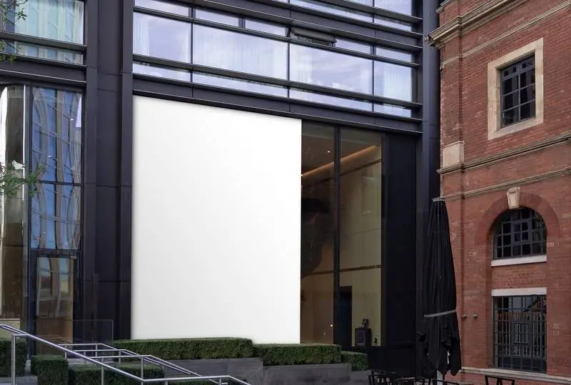 Photo of a Vertical Metal Poster with a Modern Building Background