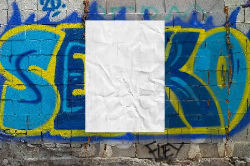Crumpled Poster on Colourful Graffiti Background