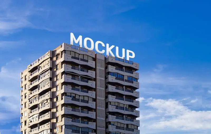 Text Mockup of a Modern Isolated Building with Blue Sky in Background