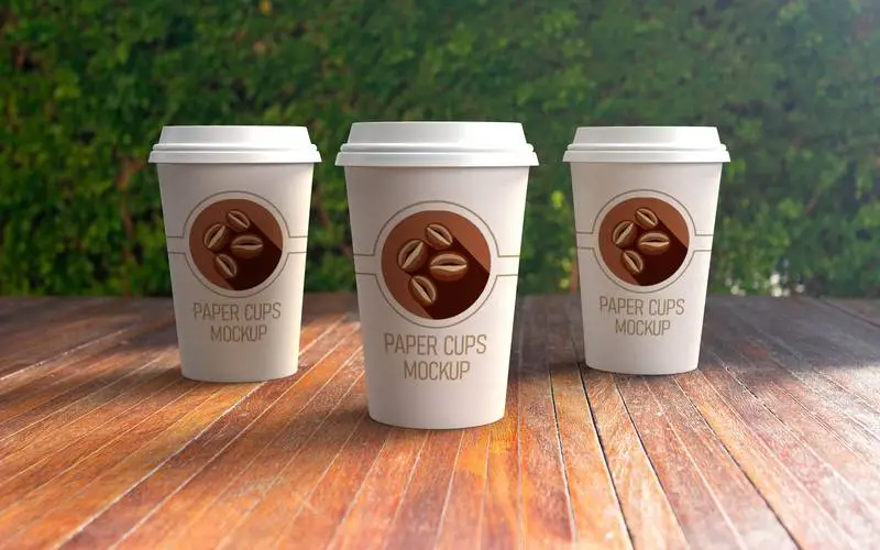 Mockup of Three Paper Cups Outdoors