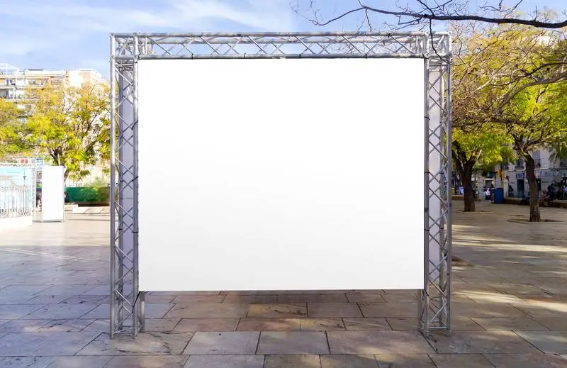 White Panel on Metal Structure for Event in Town Square with Trees