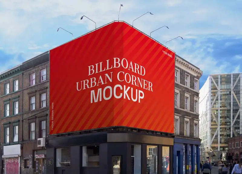 Mockup of a Billboard on a Building in a Modern City with a Cloud Background