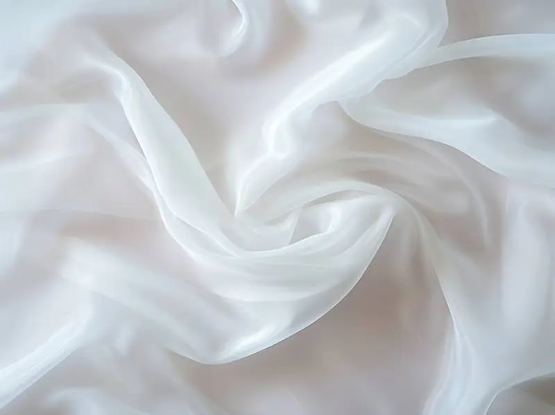 Texture of Fine Flowing White Fabric