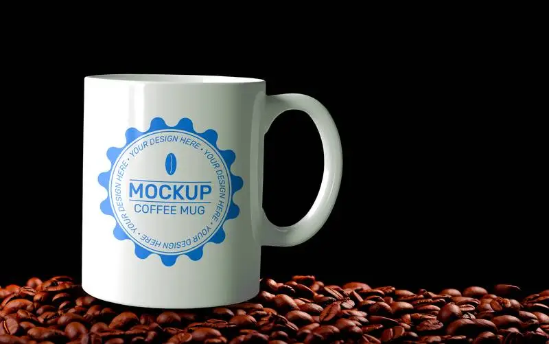 Mockup of Cup on Mountain of Coffee Beans on Black Background