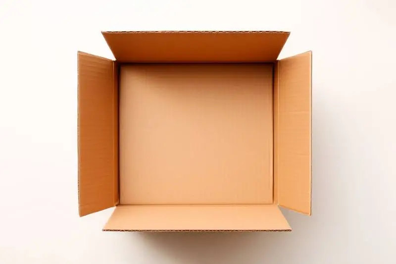 Open Cardboard Box View from Top over Blank White Background