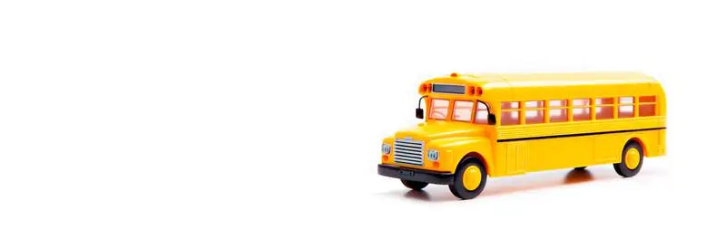 Blank Banner of a Yellow Toy School Bus on a White Background