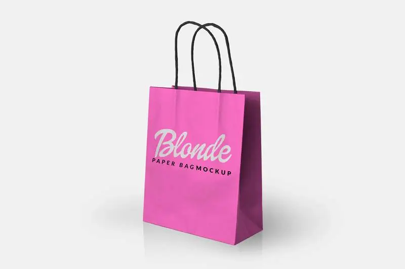 Mockup of a Pink Paper Bag on a White Surface