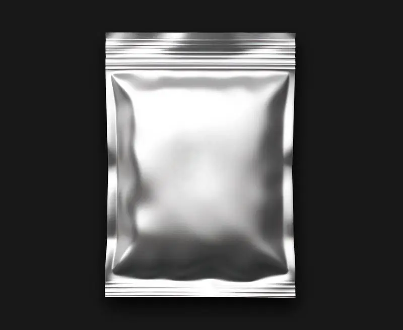 Silver Metallic Packaging Isolated on a Black Background