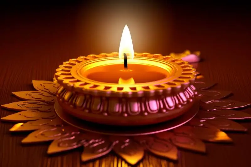 Photo of a Realistic Indian Candle on a Wooden Table