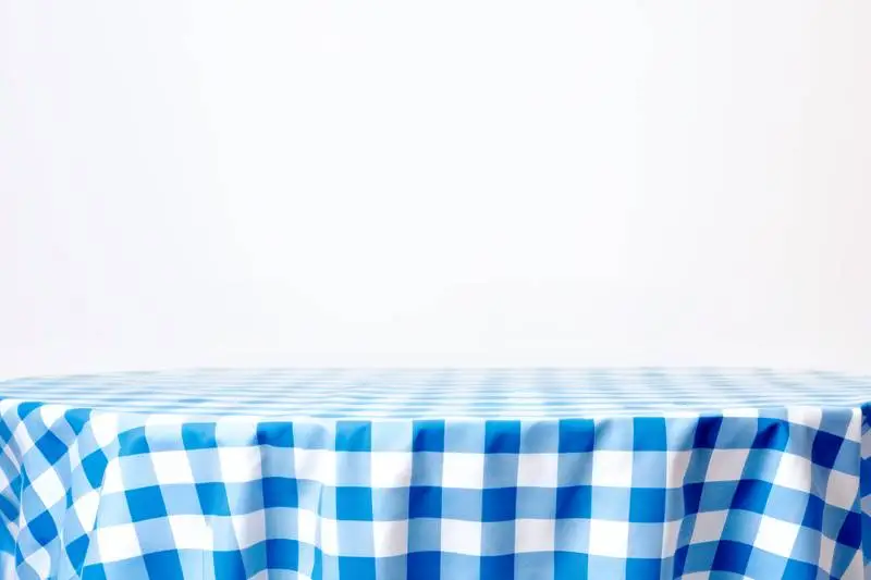 Blank Banner for Oktoberfest on a Blue Checkered Table Background