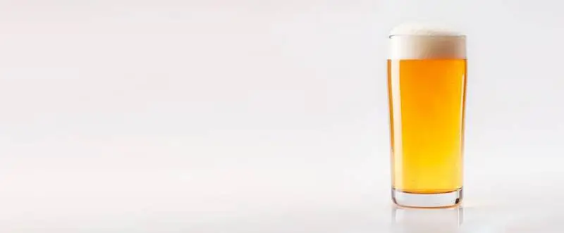 Blank Banner for Oktoberfest with a Beer Glass Isolated on a White Background