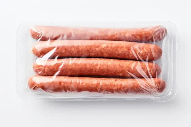 Image of an Isolated Package of German Sausages on a White Background