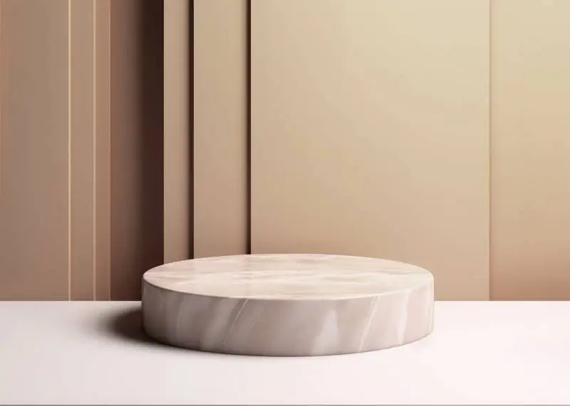 Round Marble Podium on an Abstract Beige Background