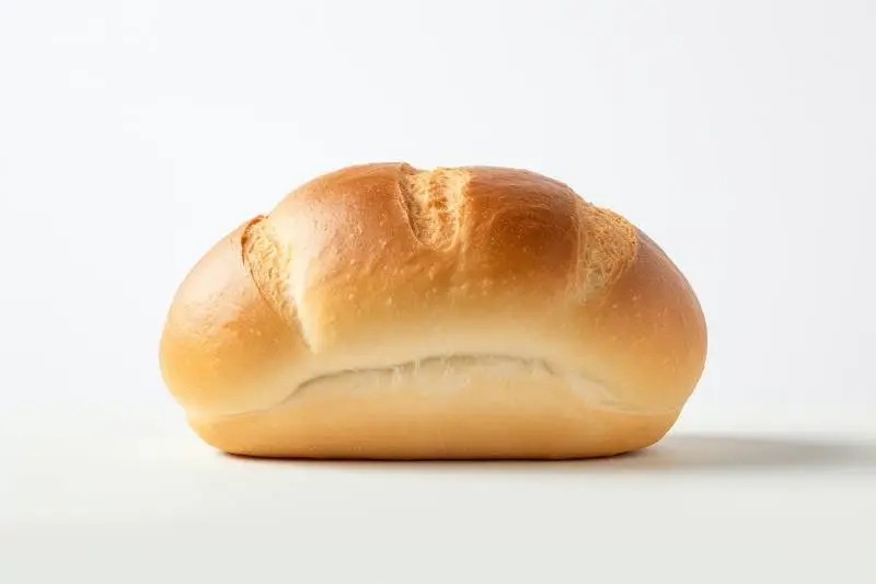 Photo of Homemade Steamed Bread Isolated on Light Background
