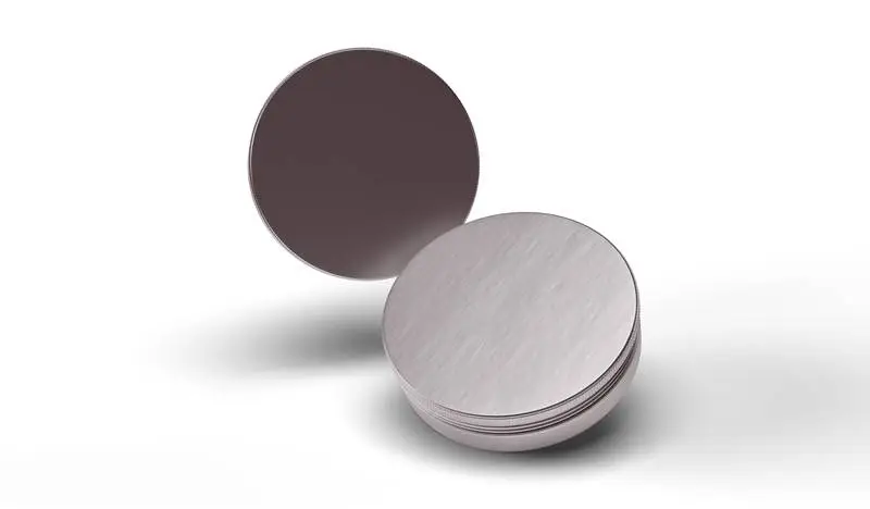 Collection of Single Metal Tins on Colored Background