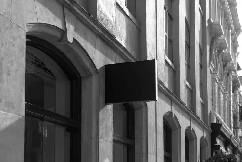 Street Sign on Classic Black and White Building