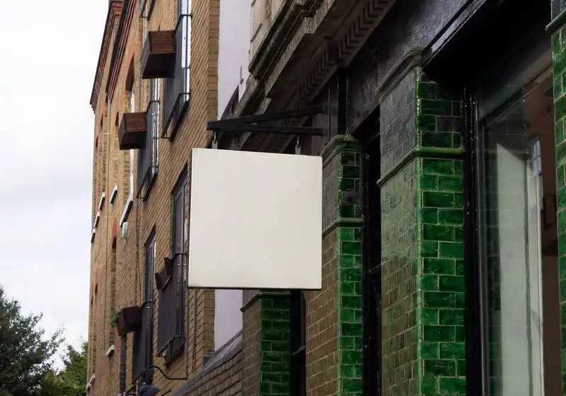 Street Sign for Retail Store with Classic Green Tile Wall