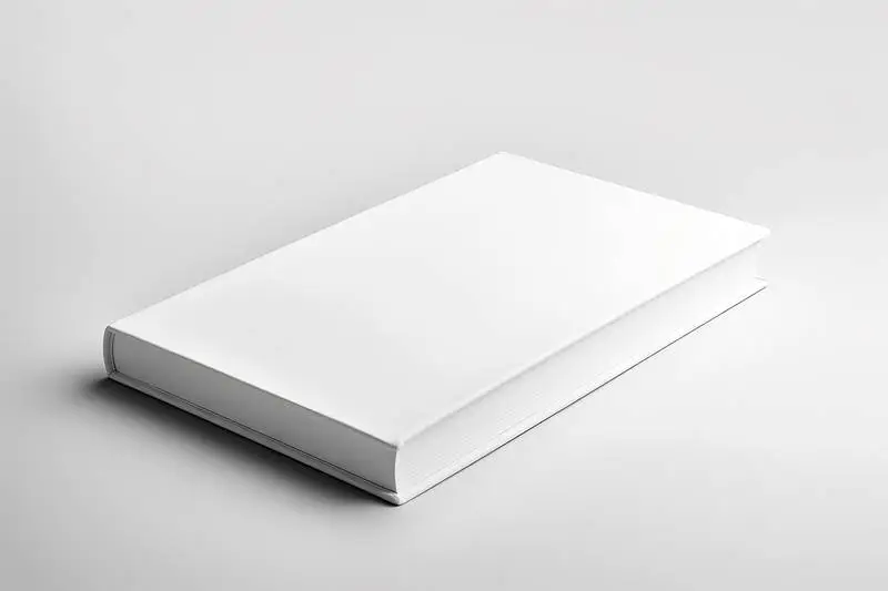 Minimalist Photo of a Blank Book on a White Surface