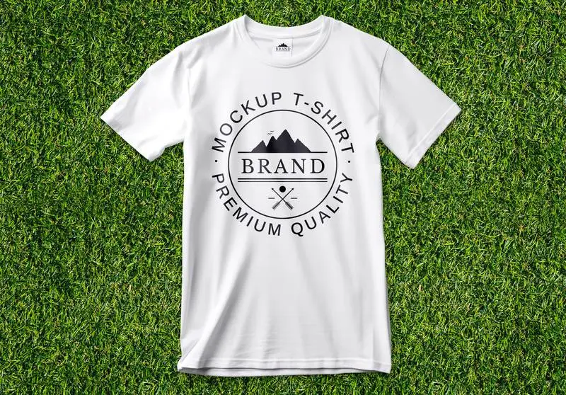 Logo Mockup on Open White T-shirt on Green Grass
