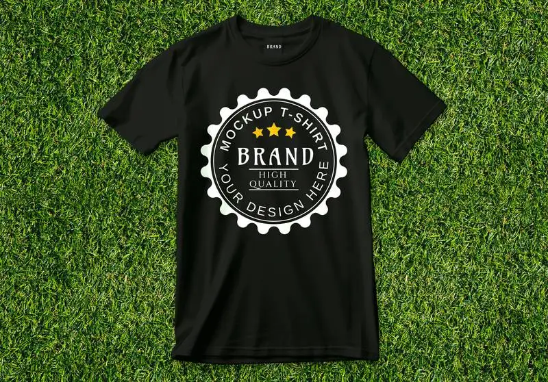 Logo Mockup on Open Black T-shirt on Green Grass
