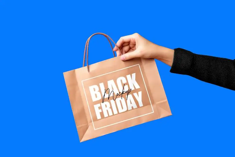 Mockup of a Paper Shopping Bag with Black Friday Design