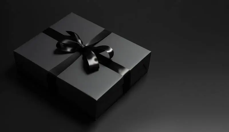 Black Box Banner With Black Ribbon on a Dark Background