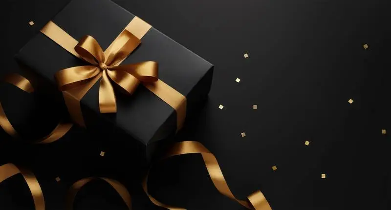Elegant Black Box Banner With Gold Ribbon on a Dark Background