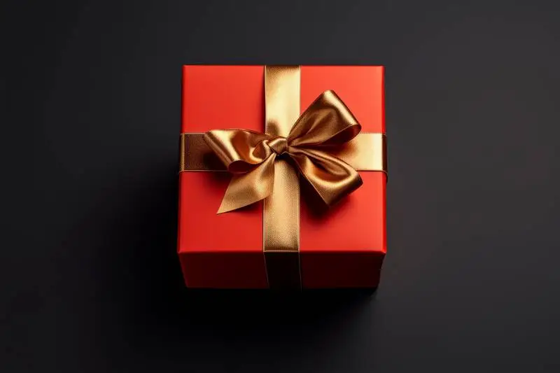 Elegant Red Box Banner With Gold Ribbon on a Dark Background