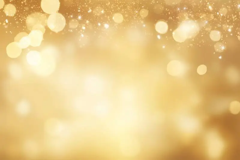Background of Blurred Burst of Light on Gold