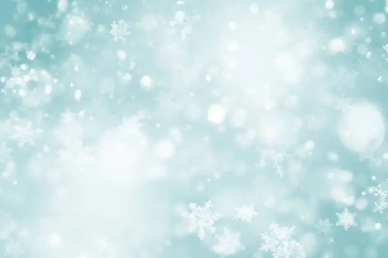 Image of Blue Blurred Lights With Small Snowflakes on a Blue Background