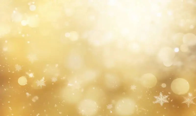 Image of Elegant Blurred Lights and Snowflakes on a Gold Background
