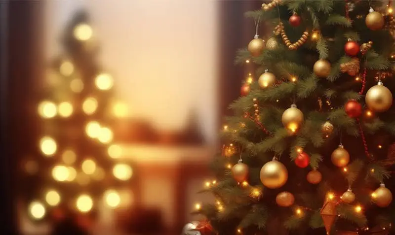 Christmas Photo of a Tree With a Room Decorated With Lights Faded in the Background