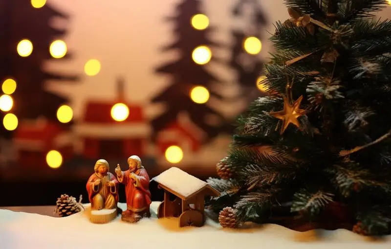 Image of Christmas Tree Decoration and Nativity Scene With Out of Focus Lights