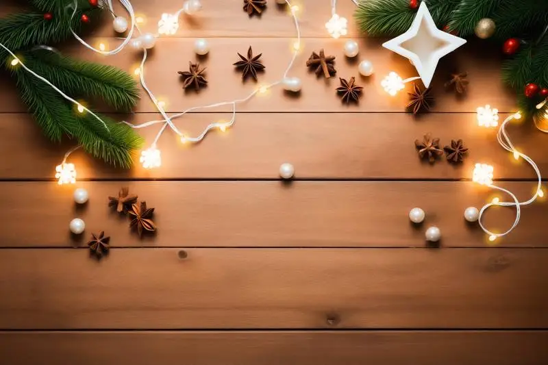 Image of Christmas Banner With Decoration of Branches and Lights on Wooden Background