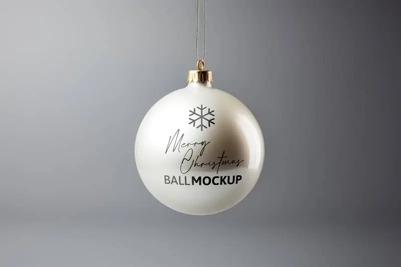 Mockup of a White Lacquered Christmas Ball Design on a Grey Background