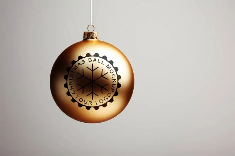 Logo Mockup on Gold Christmas Ball Hanging on Grey Background