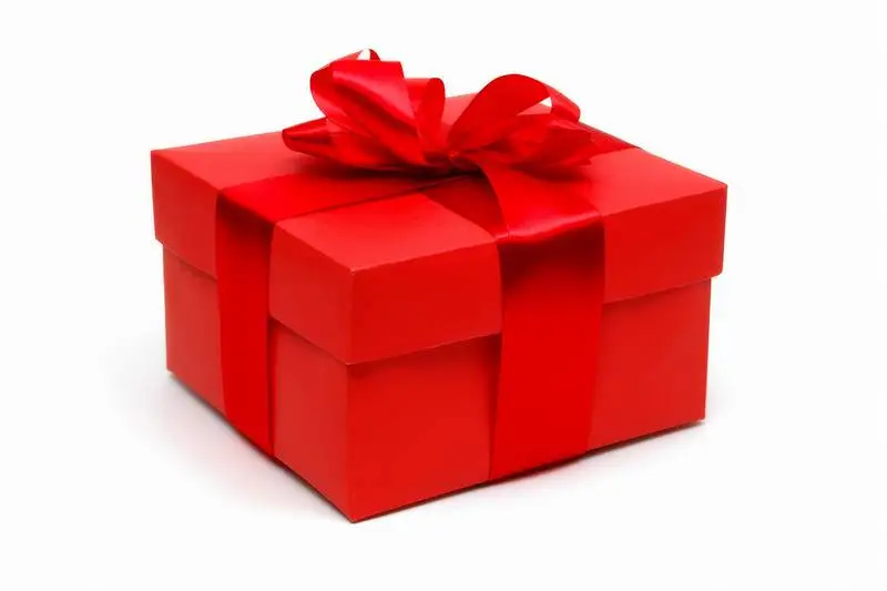 Photo of Red Gift Box Wrapped in Red Satin Ribbon on White Background