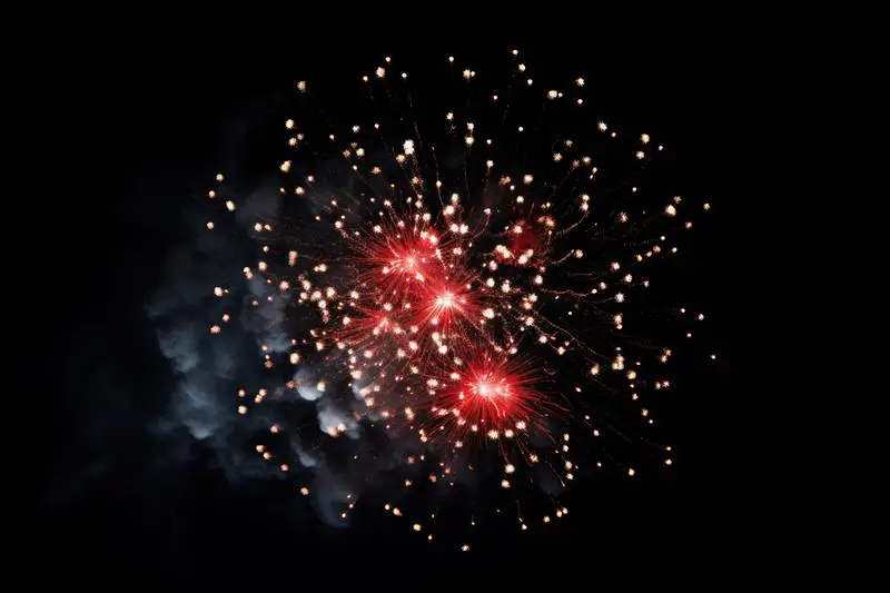 Image of Red and Yellow Fireworks on a Black Background