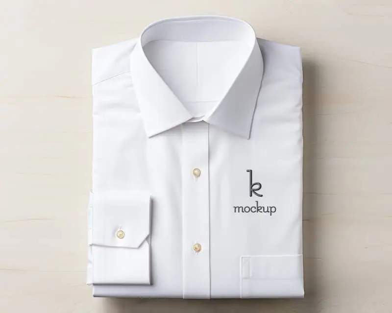 Mockup of Embroidered Logo on a Folded White Shirt