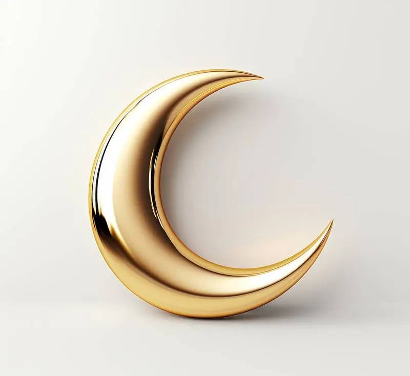Photo of a Shiny Golden 3D Crescent on a Flat Coloured Background