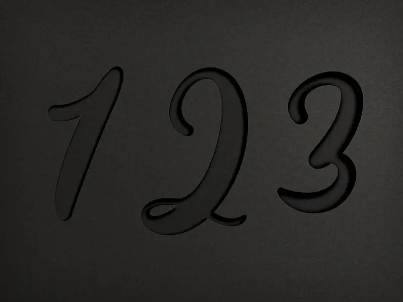Cut-Out Text Effect on Black Background in Three Depths
