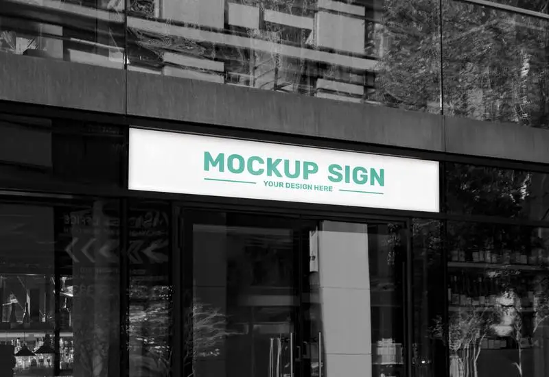 Mockup of Street Sign on Black and White Glass Building