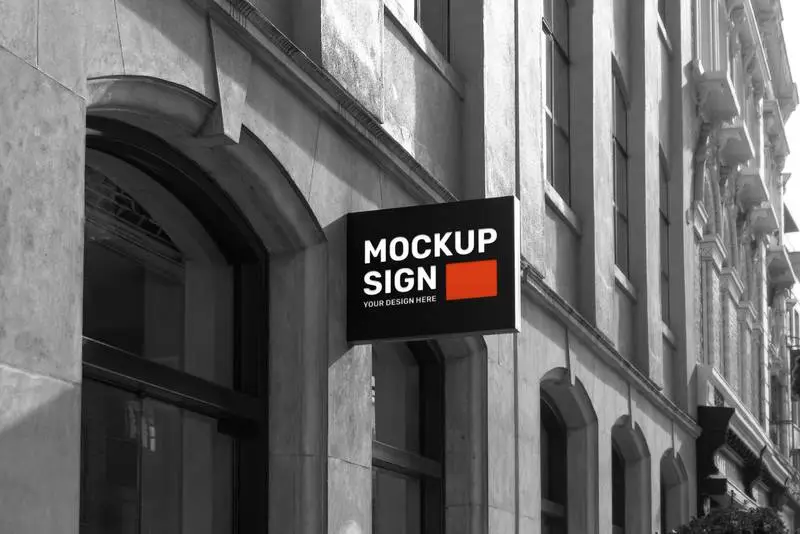Mockup of Street Sign on Classic Black and White Building