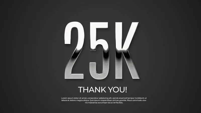 K Chrome-Plated Text on Black Background with Spotlight PSD