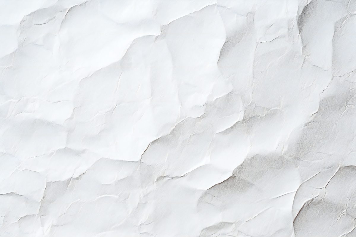 Background of crumpled white sheet of paper