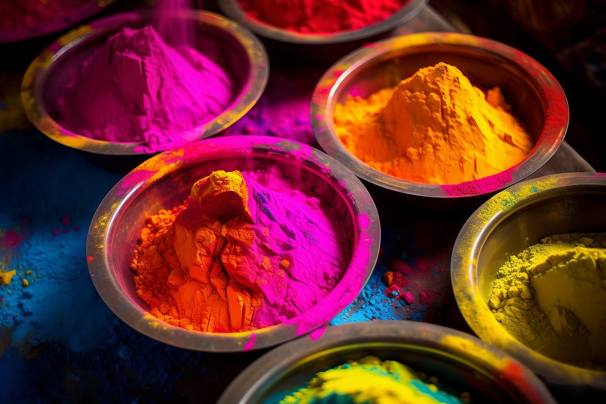 Happy Holi Bowls Containing Colorful Dust