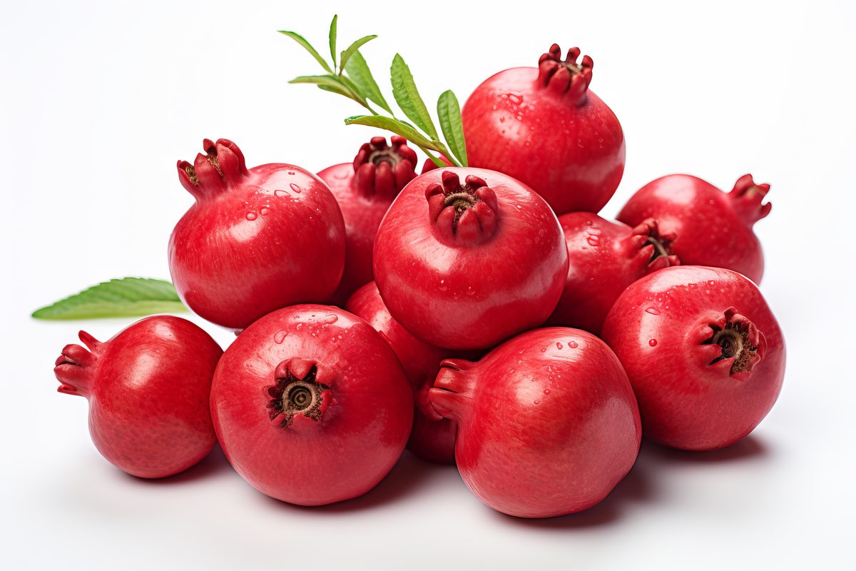 Image of pomegranate composition with white background
