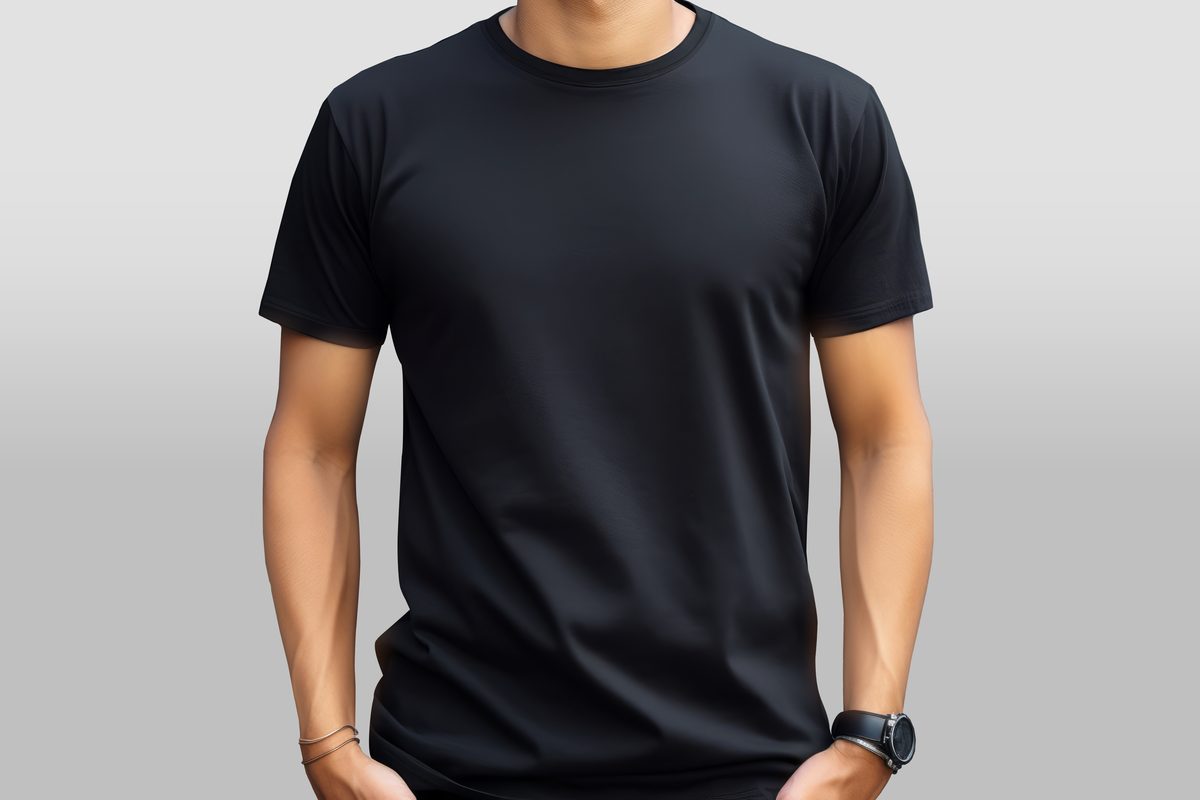 Male model wearing a black T-shirt isolated on a light background